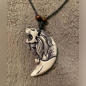 Brand new men’s Lion’s Tooth necklace
